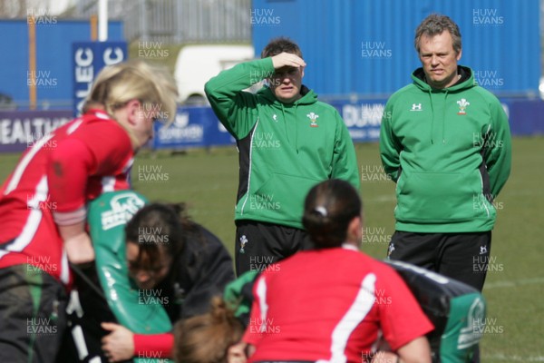 21.03.10 Wales v Italy - Womens' 6 Nations Championship - Wales coach Jason Lewis(L) & backs coach Dan Cottrell oversee the warm-up as Wales prepare to take on Italy.  