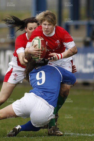 21.03.10 Wales v Italy - Womens' 6 Nations Championship - Wales' Mared Evans is tackled by Italy's Schiavon Valentina. 
