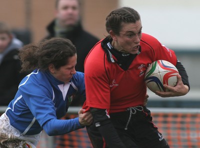 24.02.08 The Women's 6 Nations. Wales vs. Italy...  Louise Rickard powers through Anna Mariani to score for Wales.  