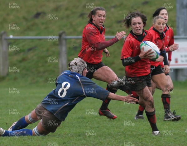 24.02.08 The Women's 6 Nations. Wales vs. Italy...  Rachel Poolman leaves Silvia Gaudino floundering.   