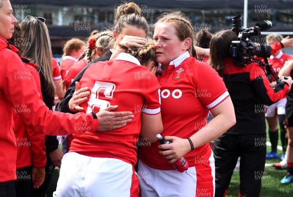300422 - Wales Women v Italy Women - TikTok Women's Six Nations - Alisha Butchers and Caryl Thomas of Wales at the end of the game