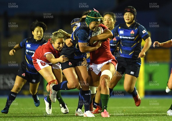 071121 - Wales Women v Japan Women - Autumn Internationals - Shione Nakayama of Japan is tackled by Elinor Snowsill and Georgia Evans of Wales