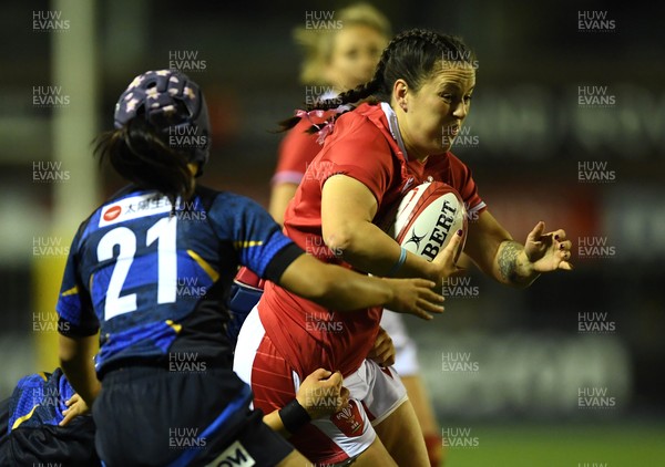 071121 - Wales Women v Japan Women - Autumn Internationals - Ffion Lewis of Wales is tackled by Shione Nakayama of Japan