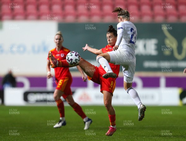 170921 - Wales Women v Kazakhstan Women, FIFA Women’s World Cup 2023 Qualifying Round - Angharad James of Wales wins the ball from Anastassiya Vlassova of Kazakhstan