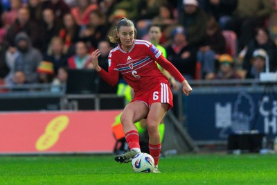 070326 - Wales v Montenegro - 2027 FIFA Women's World Cup Qualifying - Mia Ross of Wales passes the ball