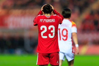 070326 - Wales v Montenegro - 2027 FIFA Women's World Cup Qualifying - Ffion Morgan of Wales reacts after missing a shot at goal