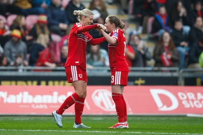 070326 - Wales v Montenegro - 2027 FIFA Women's World Cup Qualifying - Sophie Ingle of Wales celebrates with Rachel Rowe after scoring a goal