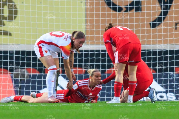 070326 - Wales v Montenegro - 2027 FIFA Women's World Cup Qualifying - Rhiannon Roberts of Wales receives medical attention