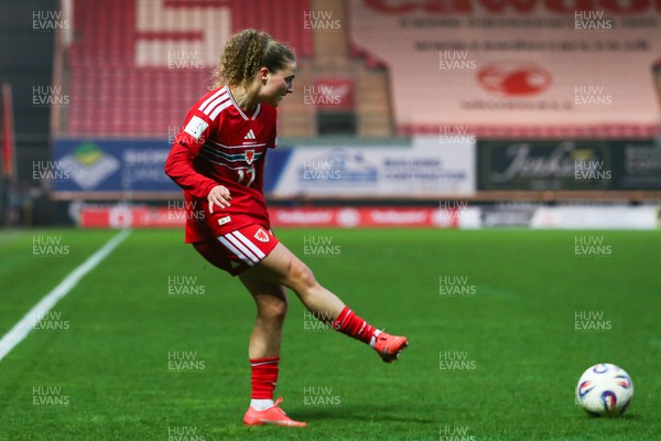 070326 - Wales v Montenegro - 2027 FIFA Women's World Cup Qualifying - Lois Joel of Wales crosses the ball