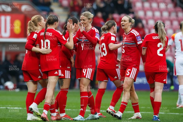 070326 - Wales v Montenegro - 2027 FIFA Women's World Cup Qualifying - Mared Griffiths of Wales celebrates with team mates after scoring a goal