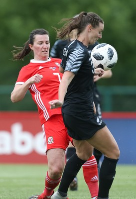 040619 - Wales v New Zealand, Women's International Challenge Match - Helen Ward of Wales and Anna Green of New Zealand compete for the ball