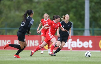 040619 - Wales v New Zealand, Women's International Challenge Match - Helen Ward of Wales takes on Abby Erceg of New Zealand
