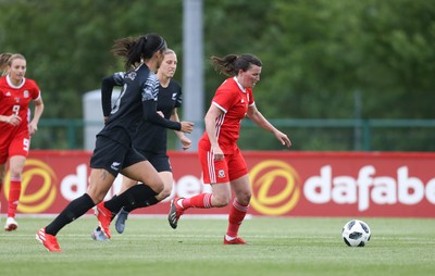 040619 - Wales v New Zealand, Women's International Challenge Match - Helen Ward of Wales takes on Abby Erceg of New Zealand