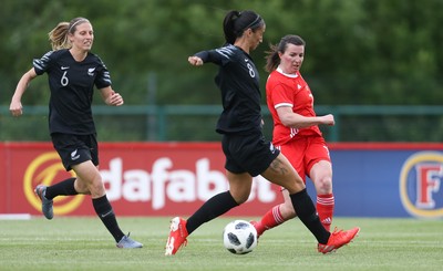040619 - Wales v New Zealand, Women's International Challenge Match - Helen Ward of Wales takes on Abby Erceg of New Zealand
