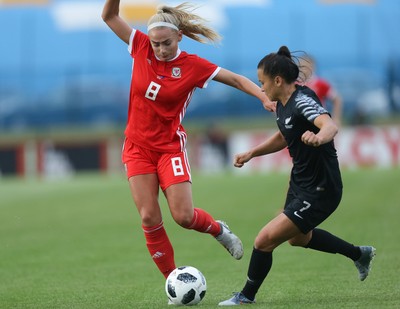 040619 - Wales v New Zealand, Women's International Challenge Match - Charlie Estcourt of Wales is challenged by Ali Riley of New Zealand