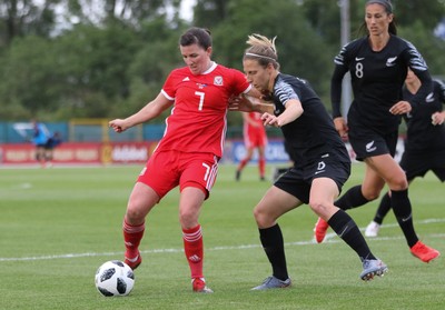 040619 - Wales v New Zealand, Women's International Challenge Match - Helen Ward of Wales holds off Rebekah Stott of New Zealand