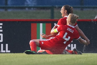 040619 - Wales v New Zealand, Women's International Challenge Match - Wales players celebrate after their late goal wins the match 1- 0