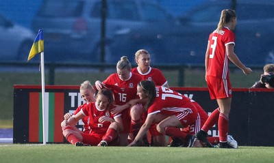 040619 - Wales v New Zealand, Women's International Challenge Match - Wales players celebrate after their late goal wins the match 1- 0