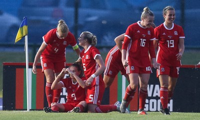 040619 - Wales v New Zealand, Women's International Challenge Match - Wales players celebrate after their late goal wins the match 1- 0