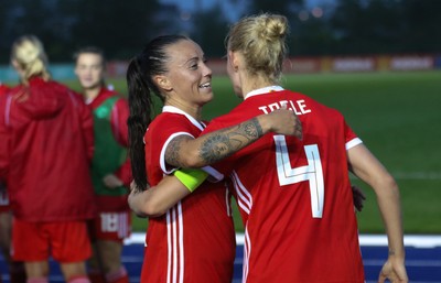 040619 - Wales v New Zealand, Women's International Challenge Match - Natasha Harding of Wales and Sophie Ingle of Wales congratulate each other at the end of the match as Wales win 1-0