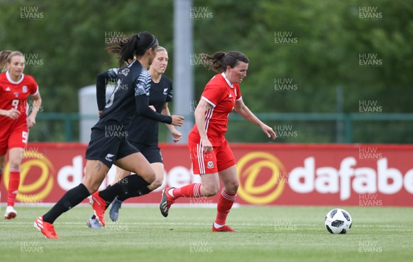 040619 - Wales v New Zealand, Women's International Challenge Match - Helen Ward of Wales takes on Abby Erceg of New Zealand