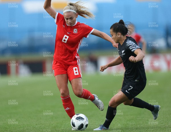 040619 - Wales v New Zealand, Women's International Challenge Match - Charlie Estcourt of Wales is challenged by Ali Riley of New Zealand