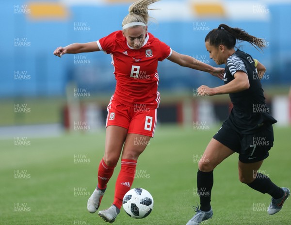 040619 - Wales v New Zealand, Women's International Challenge Match - Charlie Estcourt of Wales is challenged by Ali Riley of New Zealand