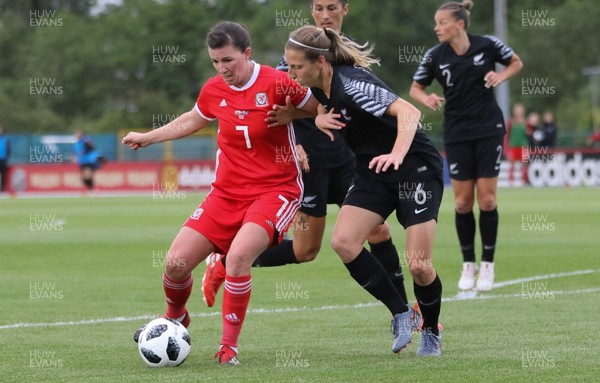 040619 - Wales v New Zealand, Women's International Challenge Match - Helen Ward of Wales holds off Rebekah Stott of New Zealand