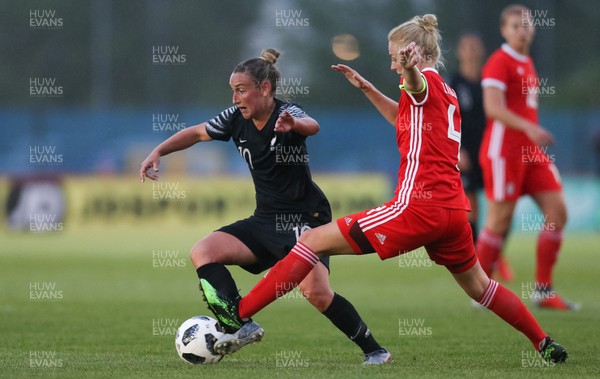 040619 - Wales v New Zealand, Women's International Challenge Match - Annalie Longo of New Zealand is challenged by Sophie Ingle of Wales