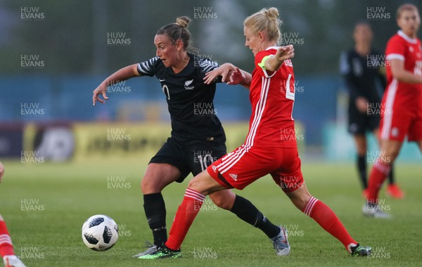 040619 - Wales v New Zealand, Women's International Challenge Match - Annalie Longo of New Zealand is challenged by Sophie Ingle of Wales