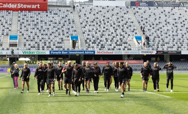281023 - Wales Women v New Zealand Women, WXV1 - The Wales team walk out on the pitch ahead of Wales v New Zealand in Dunedin