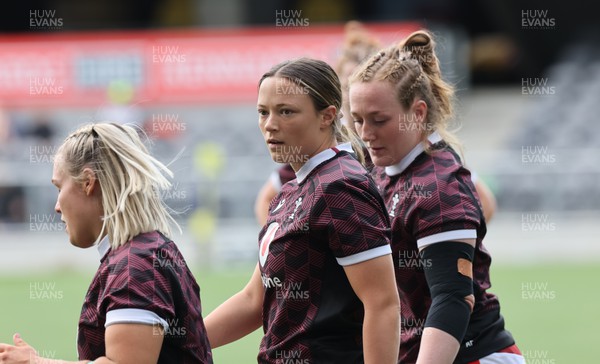 281023 - Wales Women v New Zealand Women, WXV1 - Alex Callender, Alisha Butchers and Abbie Fleming of Wales during warm up
