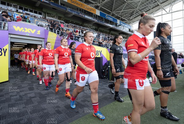 281023 - Wales Women v New Zealand Women, WXV1 - Keira Bevan of Wales and Lleucu George of Wales walk out at the start of the match
