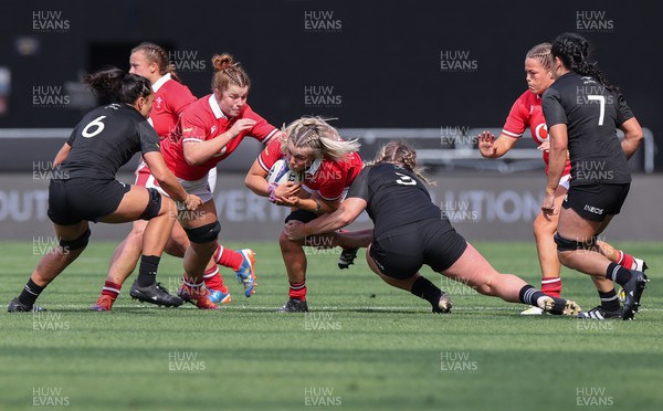 281023 - Wales Women v New Zealand Women, WXV1 - Alex Callender of Wales is tackled by Amy Rule of New Zealand