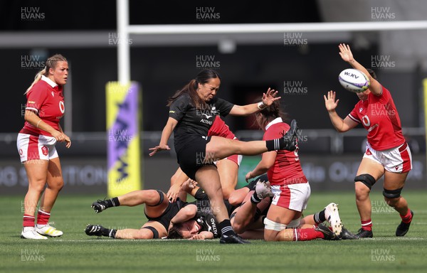 281023 - Wales Women v New Zealand Women, WXV1 - Alisha Butchers of Wales looks to charge down a kick from Arihiana Marino-Tauhinu of New Zealand