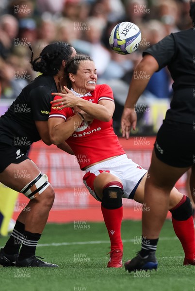 281023 - Wales Women v New Zealand Women, WXV1 - Jasmine Joyce of Wales loses the ball as she is tackled