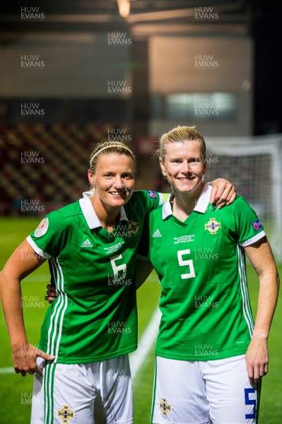 030919 - Wales v Northern Ireland - UEFA Women's Euro Qualifier - Ashley Hutton and Julie Nelson of Northern Ireland who celebrate their 100th caps 