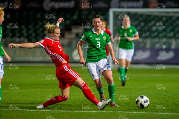 030919 - Wales v Northern Ireland - UEFA Women's Euro Qualifier - Rhiannon Roberts of Wales tackles Demi Vance of Northern Ireland 