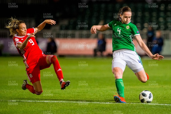 030919 - Wales v Northern Ireland - UEFA Women's Euro Qualifier - Kayleigh Green of Wales launches a tackle on Sarah McFadden of Northern Ireland 