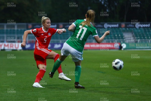 030919 - Wales v Northern Ireland - European Women's Championship - Group Stage -  Rhiannon Roberts of Wales has her cross blocked by Lauren Wade of Northern Ireland 