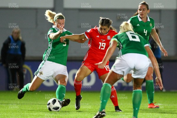 030919 - Wales v Northern Ireland - European Women's Championship - Group Stage -  Megan Wynne of Wales and Julie Nelson of Northern Ireland compete for the ball