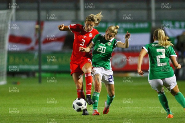 030919 - Wales v Northern Ireland - European Women's Championship - Group Stage -  Gemma Evans of Wales and Rebecca McKenna of Northern Ireland compete for the ball