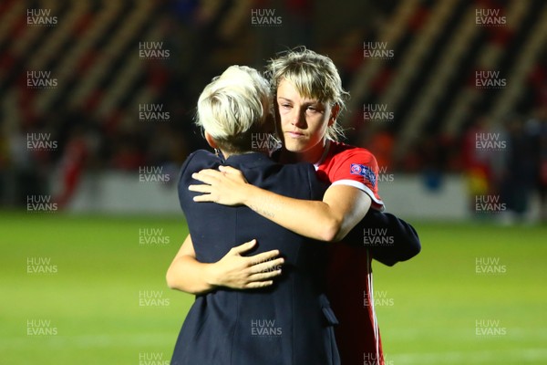 030919 - Wales v Northern Ireland - European Women's Championship - Group Stage -  A dejected Gemma Evans of Wales is consoled by Jess Fishlock after the final whistle