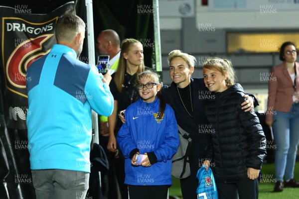 030919 - Wales v Northern Ireland - European Women's Championship - Group Stage -  Jess Fishlock takes time to meet young fans after the final whistle