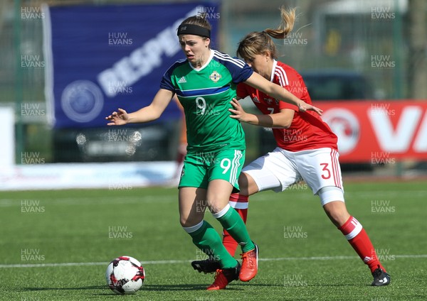 070417 - Wales Women v Northern Ireland Women, International Friendly  - Simone Magill of Northern Ireland holds off Gemma Evans of Wales