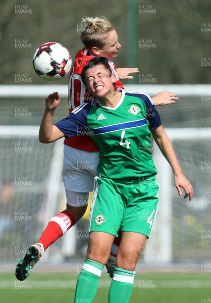 070417 - Wales Women v Northern Ireland Women, International Friendly  - Jessica Fishlock of Wales and Laura Rafferty of Northern Ireland compete for the ball