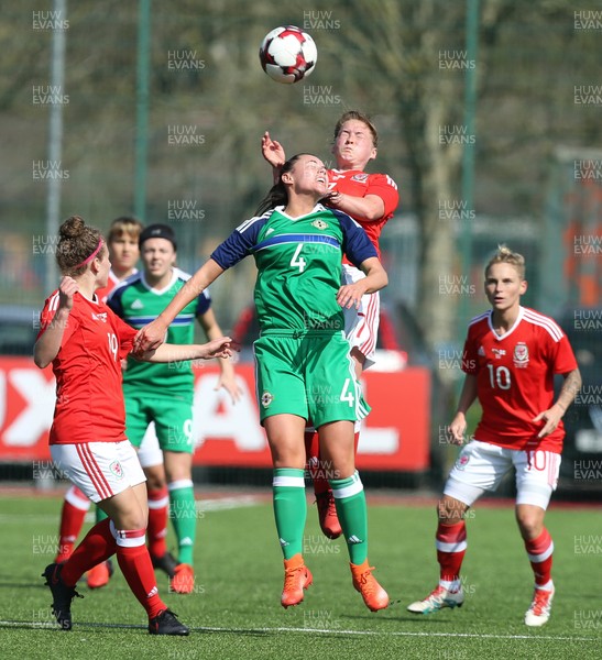 070417 - Wales Women v Northern Ireland Women, International Friendly  - Rachel Rowe of Wales gets above Laura Rafferty of Northern Ireland to head the ball