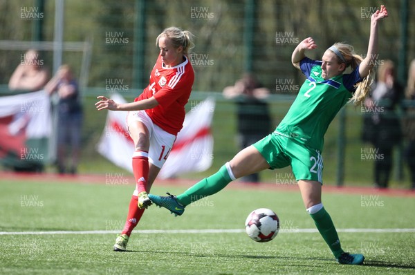 070417 - Wales Women v Northern Ireland Women, International Friendly  -Nadia Lawrence of Wales shoots past Rachel Newborough of Northern Ireland to score goal