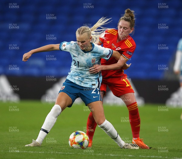 271020 - Wales Women v Norway Women - European Championship Qualifier - Karina Savik of Norway is tackled by Rachel Rowe of Wales