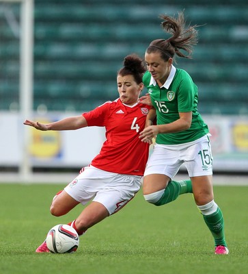 190816 - Wales Women v Republic of Ireland, Friendly Challenge - Angharad James of Wales tackles Katie McCabe of Ireland